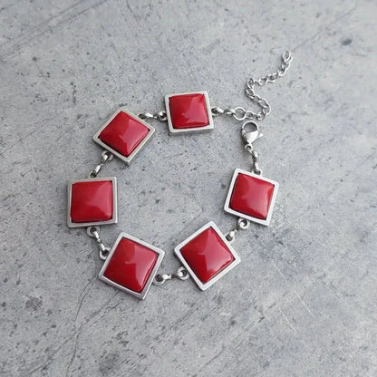 Crvena narukvica na kopčanje Selesta